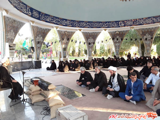 مراسم معنوی زیارت عاشورا در گلزار شهدای بهشت رضا شهرایلام
