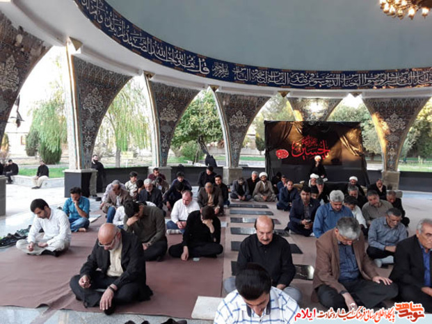 مراسم معنوی زیارت عاشورا در گلزار شهدای بهشت رضا شهرایلام