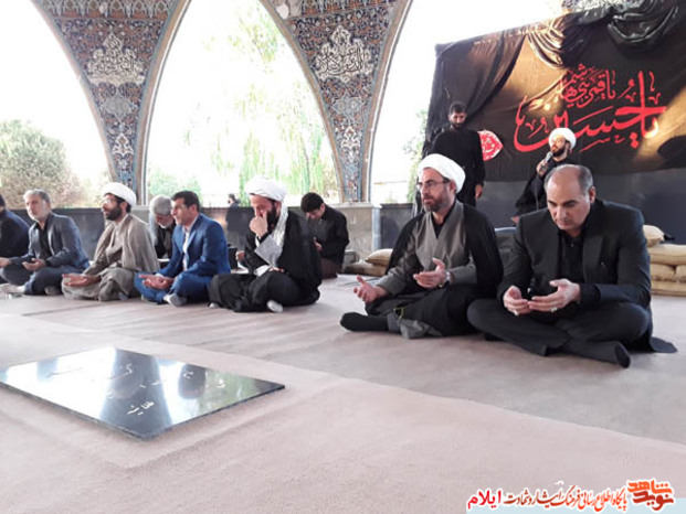 مراسم معنوی زیارت عاشورا در گلزار شهدای بهشت رضا شهرایلام