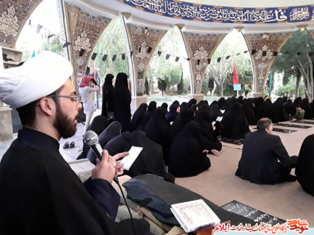 مراسم معنوی زیارت عاشورا در گلزار شهدای بهشت رضا شهرایلام